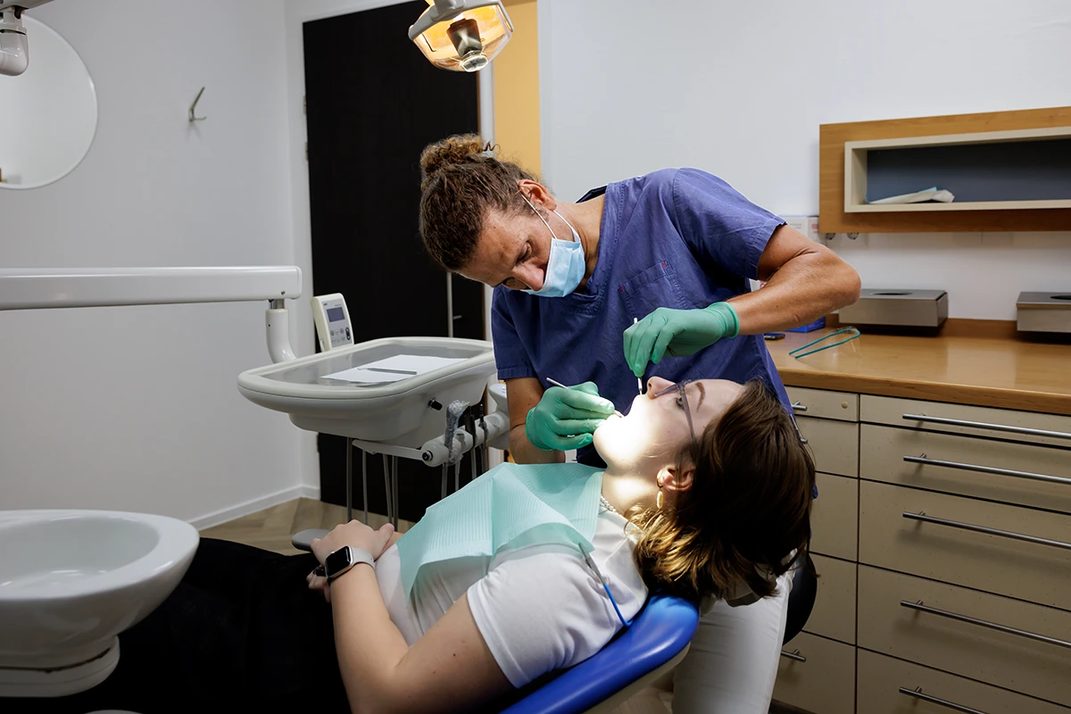 David Smitz working as a dentist