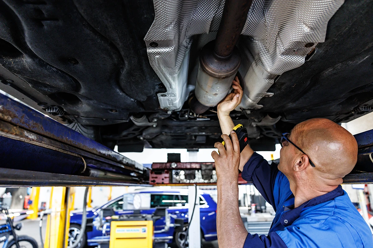 KwikFit employee at a local branch KwikFit employee at a local branch